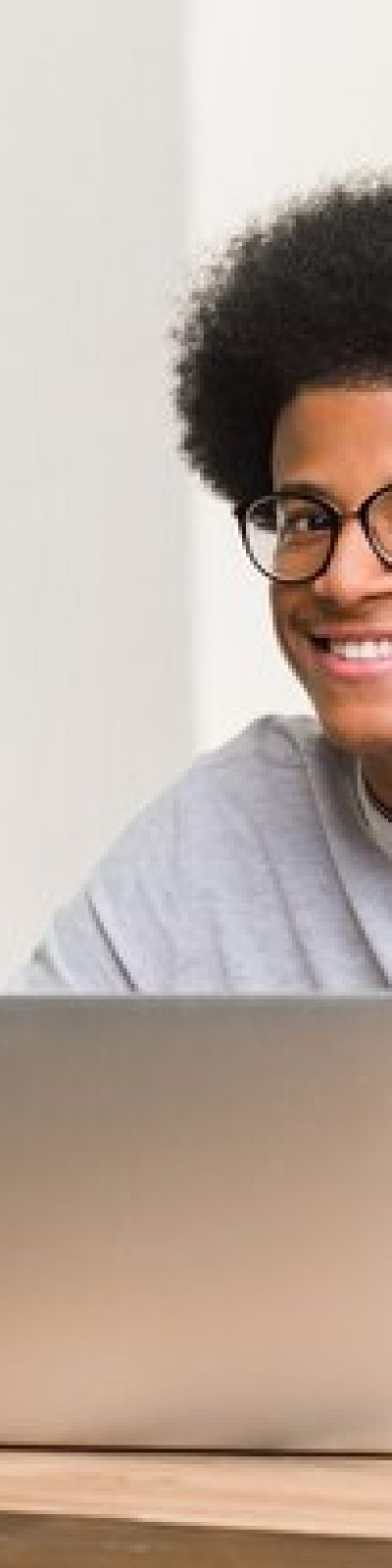 young-black-man-using-his-laptop-cheerful-confident-doing-ok-gesture_1187-20781